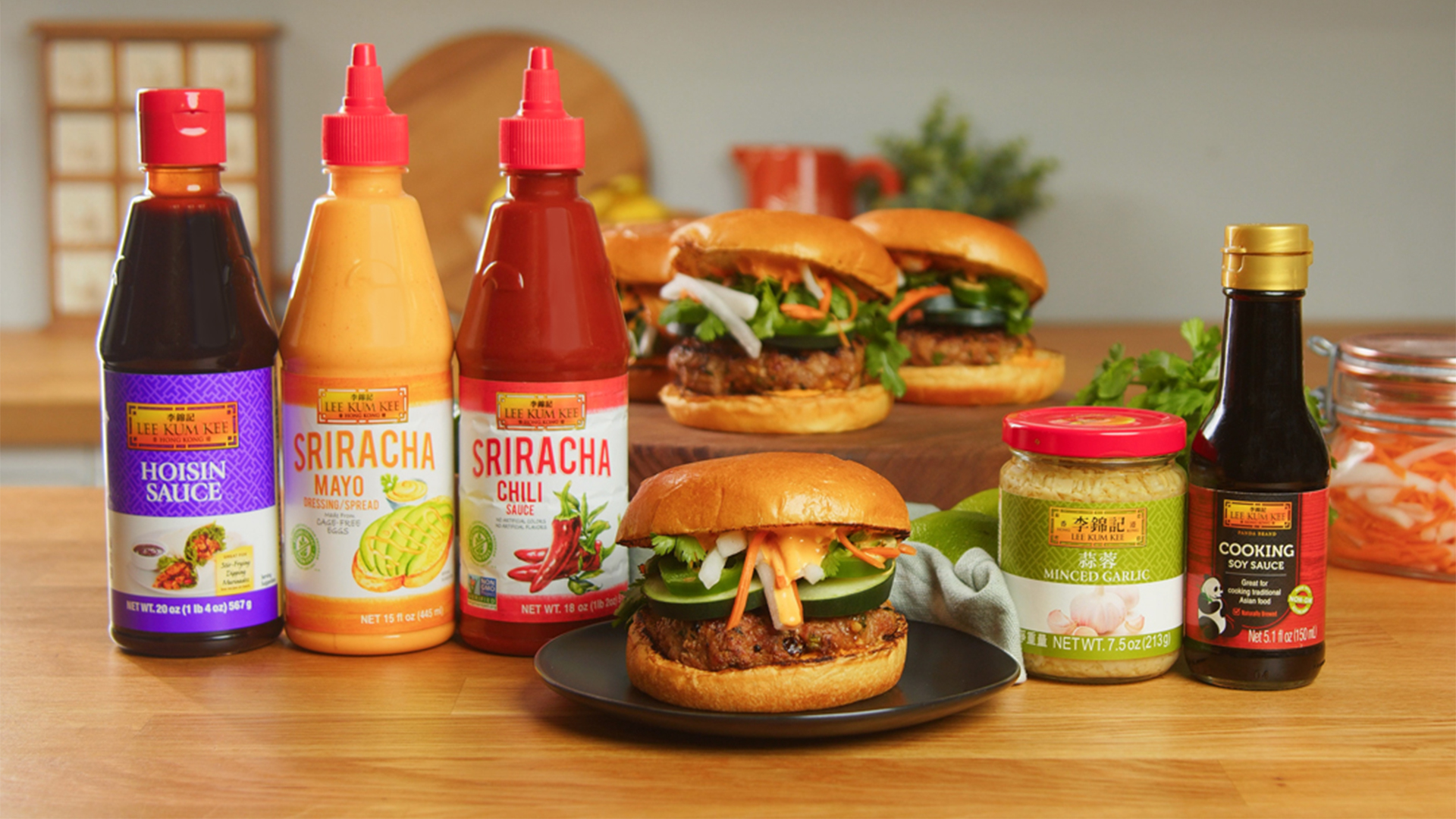 Pork bánh mì burgers displayed with Lee Kum Kee sauces